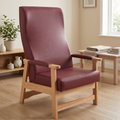 A high-back bariatric chair with burgundy upholstered seat and backrest on a light natural wood frame, shown in a bright living room setting.